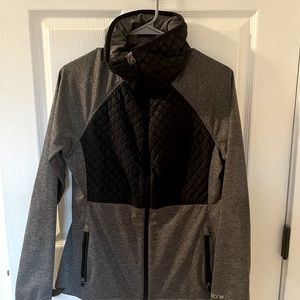 Burton women’s jacket. Zip up hood. Size small.